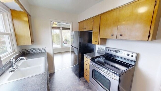 Building Photo - Sun-Drenched Mt. Tabor Home with Massive Yard & Oversized Shop-Garage!