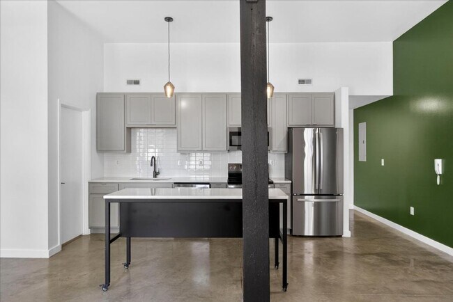 Building Photo - Green with Enby