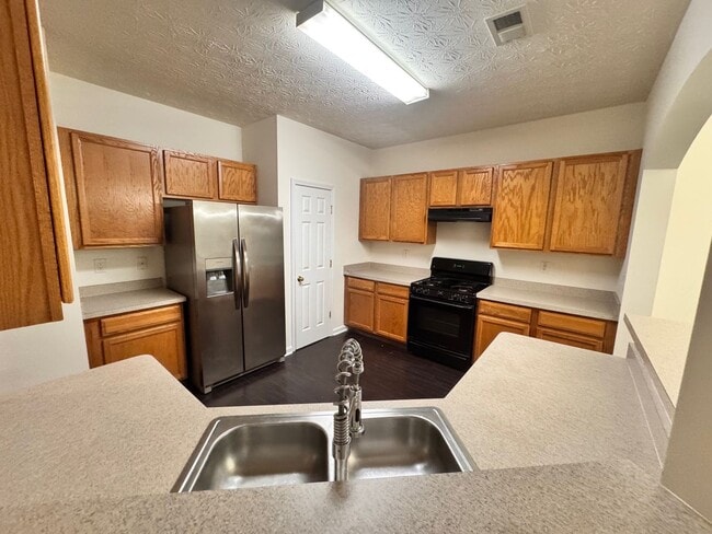 Building Photo - Peaceful 2-Story Townhome - Soothing sound...