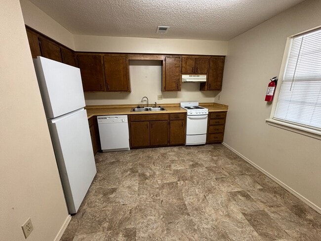 Building Photo - 311 N Joplin, Apt 1-7