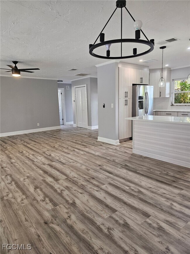 Building Photo - 3933 E River Dr