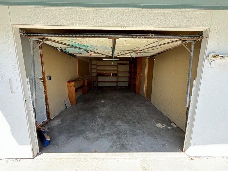 22.5' x 10' garage space with 240v outlet for EV charging or other appliances. - 1718 White Ave