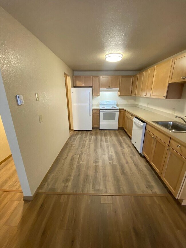 Building Photo - Two bedroom unit with balcony available in...