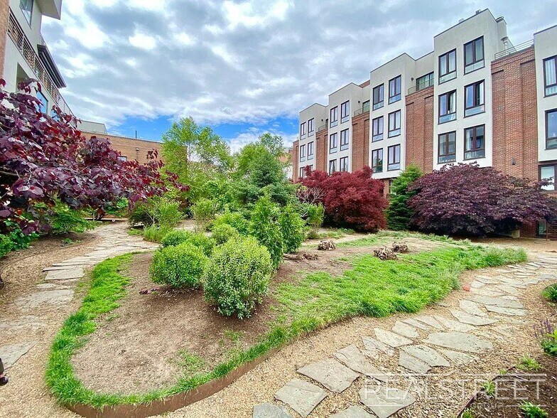 Building Photo - Modern Ground-Floor 1 Bedroom with Gym, Roof Deck & Courtyard in Prime Williamsburg
