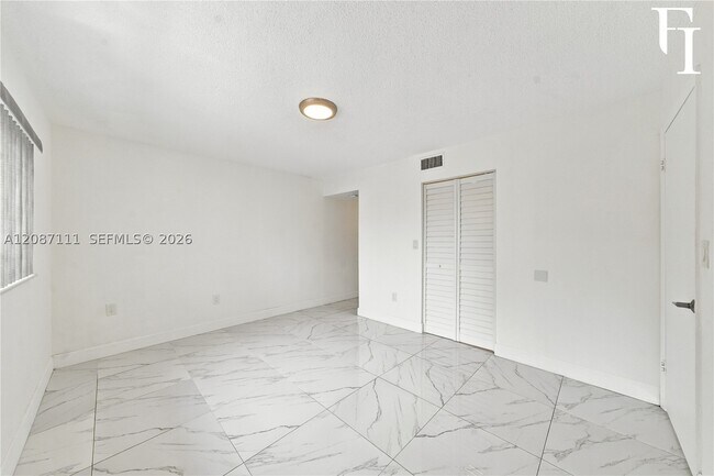 Building Photo - 6965 Harding Ave