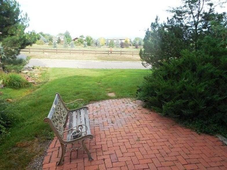 Front Patio & Lawn face Open Space & Mts - 1210 Wicklow St