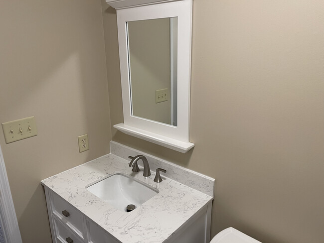 New vanities with framed mirrors - 705 Candlewood Dr