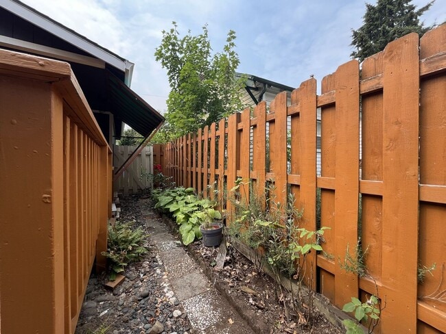 Building Photo - Single-Level 3-Bedroom Home with 2-Car Garage, Mini-Split AC, & Backyard Garden Space