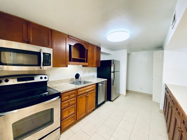 Building Photo - {5639} Spacious Ranch + Two Separate Living Quarters + Fenced Yard!