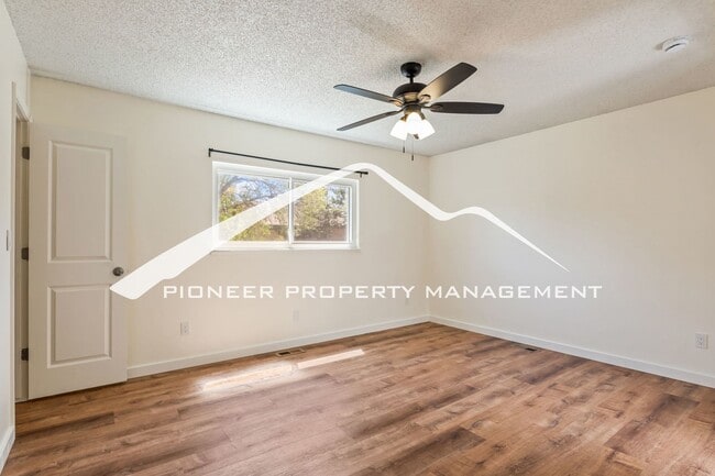 Building Photo - Updated 4 Bed, 2 Bath Home in Briargate with Mountain Views, fully fenced yard, 2 car garage and AC