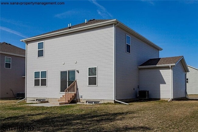 Building Photo - "Ankeny Oasis: Luxurious 4-Bedroom Home with Expansive 3-Car Garage and Secluded Backyard Retreat!"