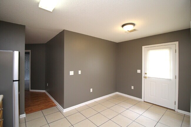 Building Photo - Don’t Miss This Milton Duplex — 2BR/2BA Brick Home with Garage, Walk-In Closet, Open Living Space...