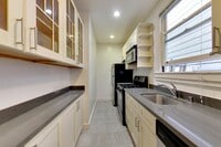 Building Photo - 2BR. Private Patio! Parking! DISHWASHER! On-Site LAUNDRY! HARDWOOD!