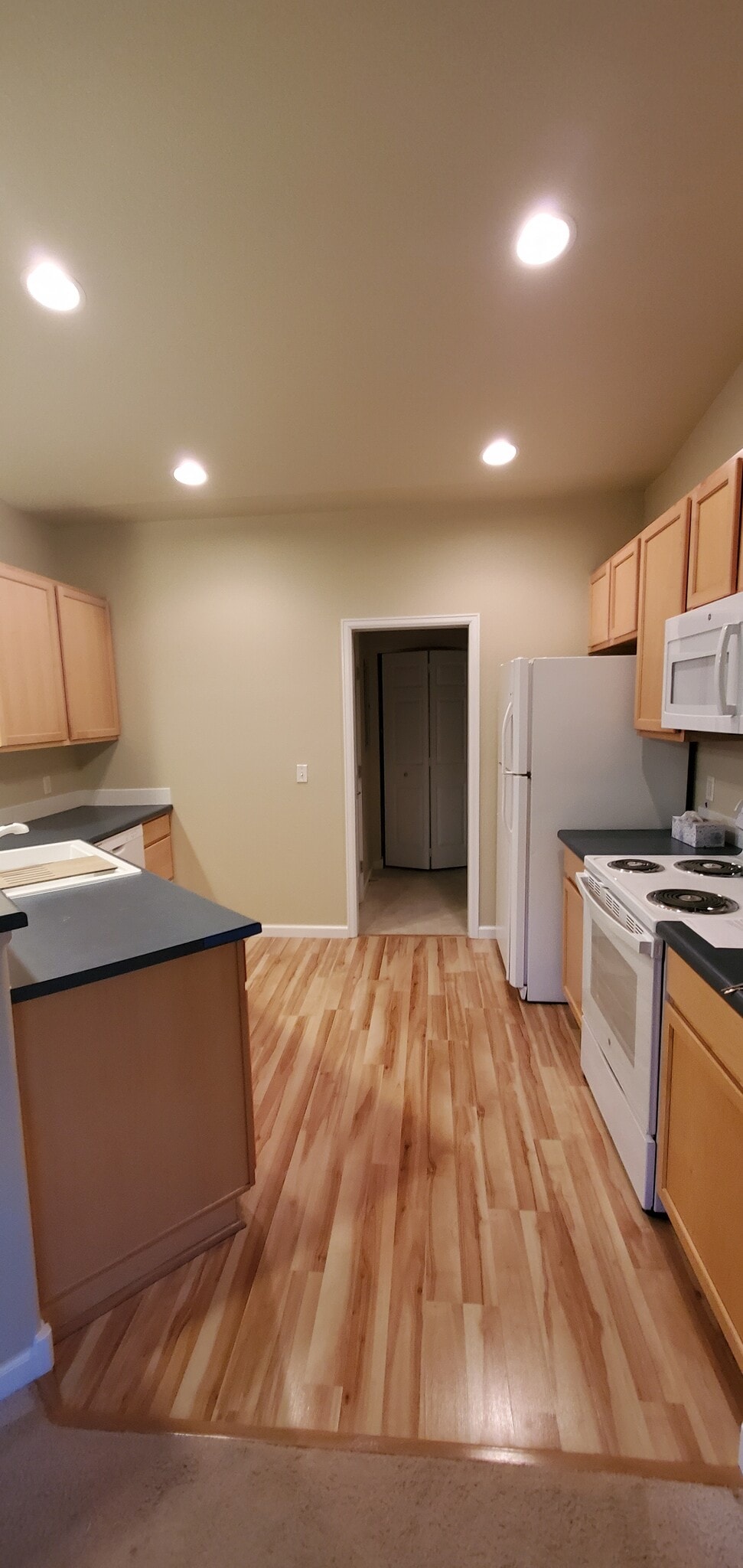 Kitchen includes all appliances. Door off kitchen leads to laundry and pantry. - 2214 Owens Ave