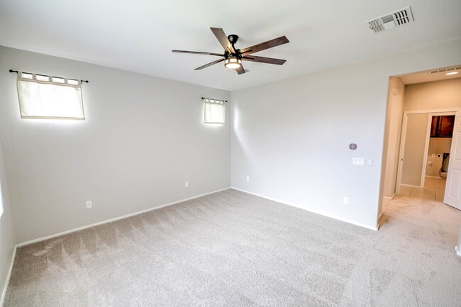 Building Photo - 4 Bedroom with new carpet and new interior paint in Saguaro Trails!