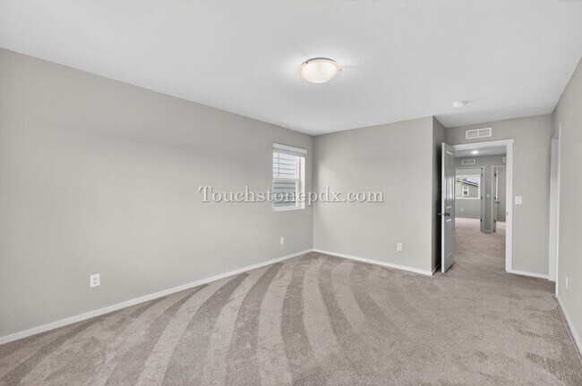 Building Photo - Recently Built Woodburn Townhome Featuring A/C