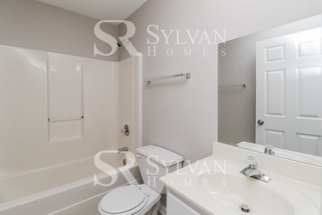 Building Photo - Turn the key. Enter. Smile. Repeat every day!