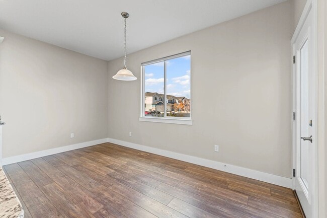 Building Photo - Upgraded 4-Bed Townhome with Finished Base...