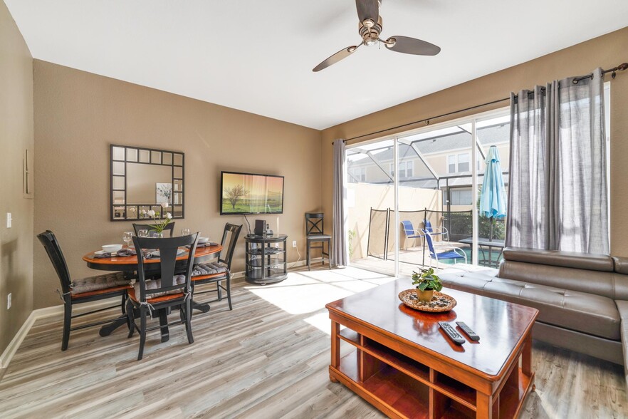 open concept dining room - 7663 Sir Kaufmann Ct