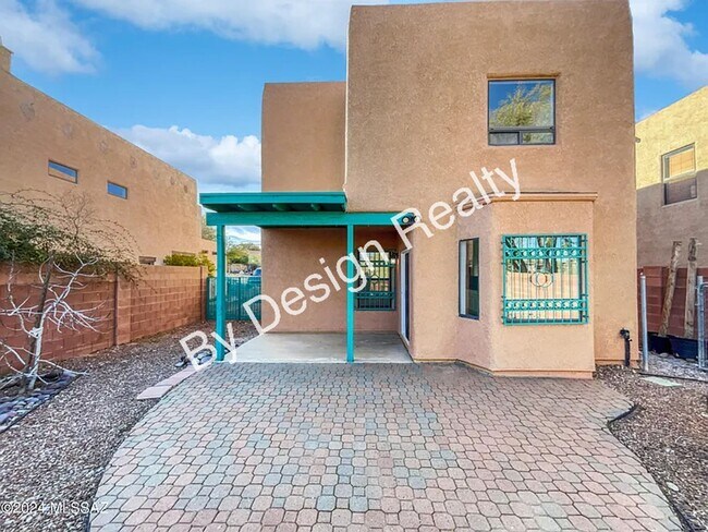 Building Photo - Updated SE Tucson 3BR/2.5BA Gem: Cathedral Ceilings & Private Wash Views