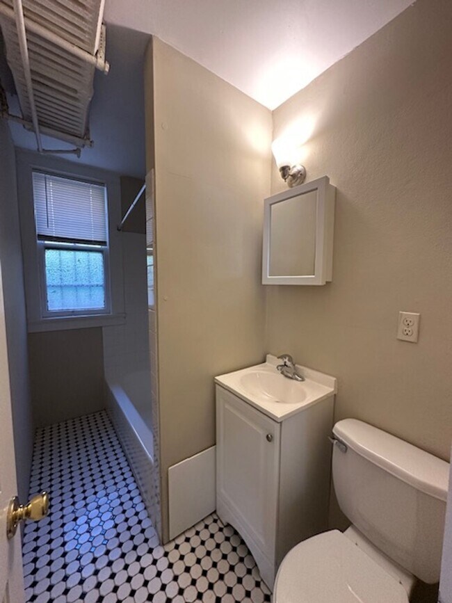 Building Photo - Freshly Renovated 2BR Garden Apartment Near UWM $1,350/mo – Heat + Parking Included