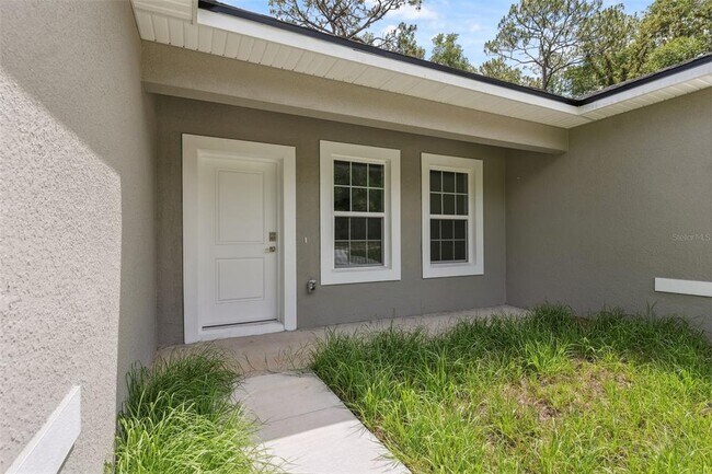 Building Photo - 10089 N Athenia Dr