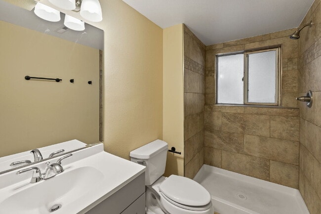 Building Photo - Spacious Split-Level Home with Finished Basement, Deck, Fenced Yard & 2-Car Garage