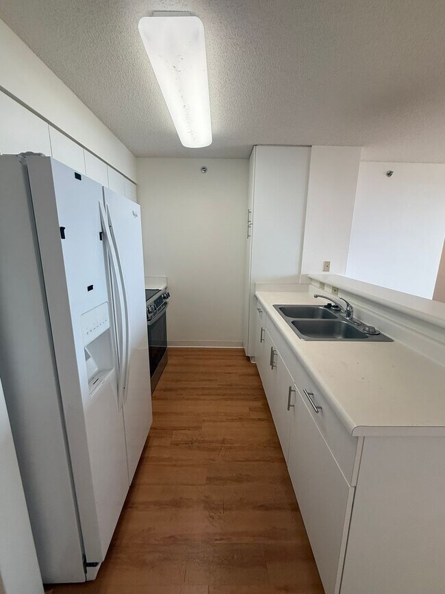 Building Photo - AC in Every Room. TWO Parking Stalls.