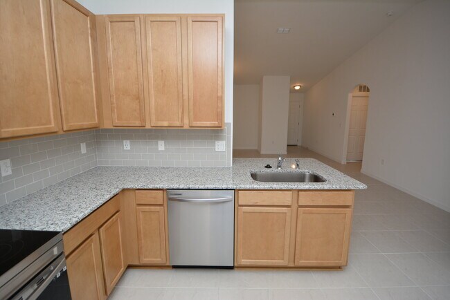 Building Photo - "Charming 3-Bedroom Duplex with Granite El...