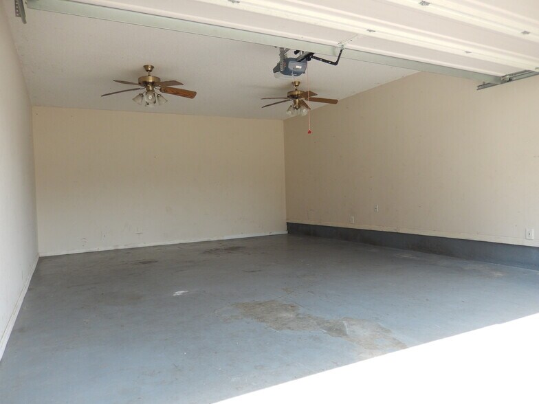 Inside of Garage with Ceiling Fans Installed - 2065 Pinemount Blvd