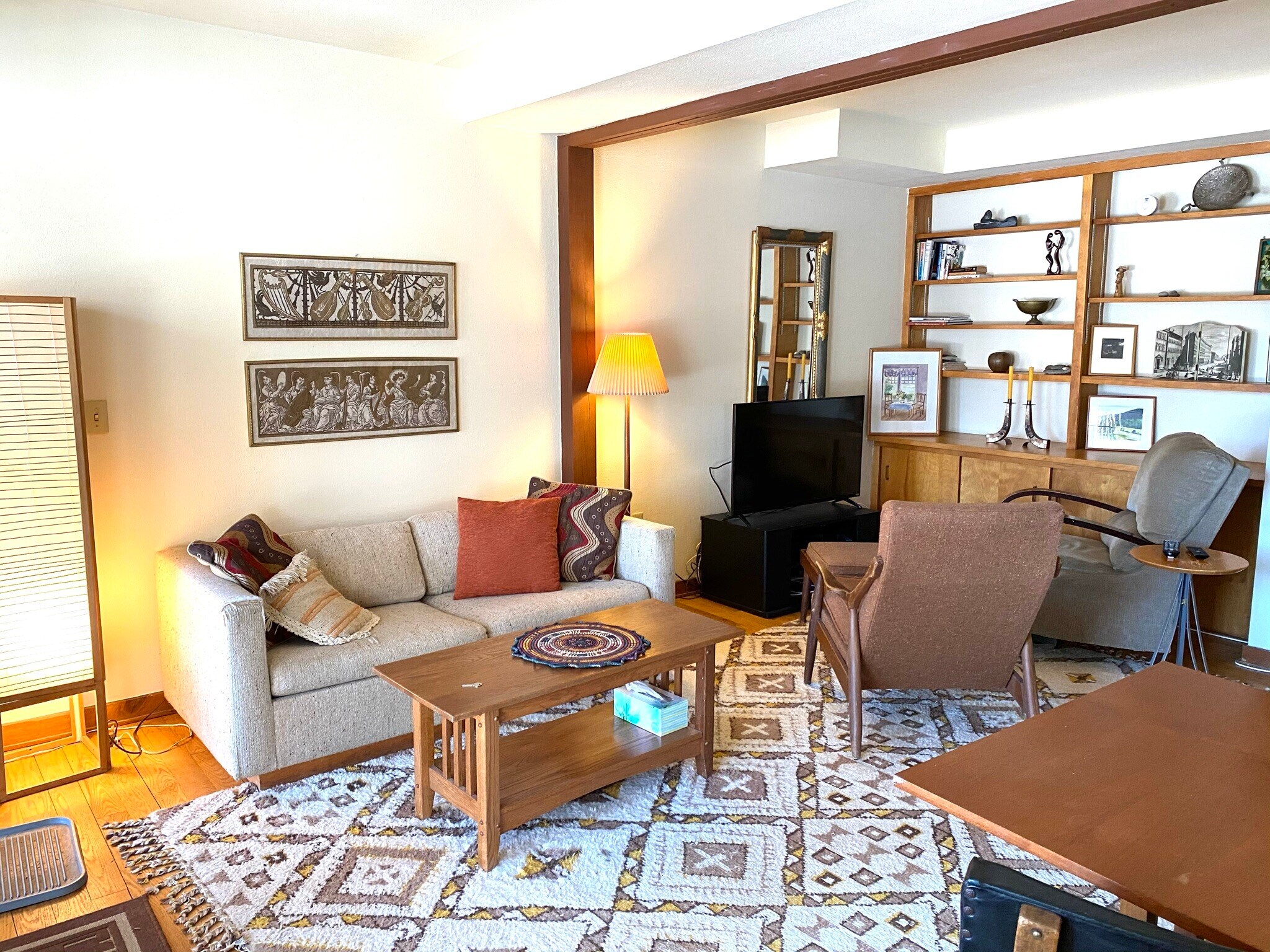 Living room sofa with built-in bookshelves 2 - 206 Hanshaw Rd