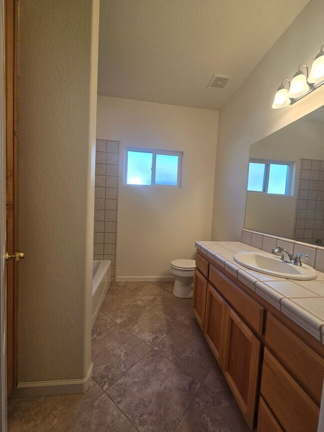 Building Photo - 4 BR 2 BA home available now