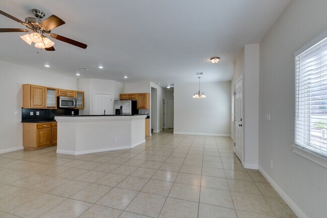 Building Photo - Great townhome in Henderson Gated Community with a 2 car attached garage and backyard