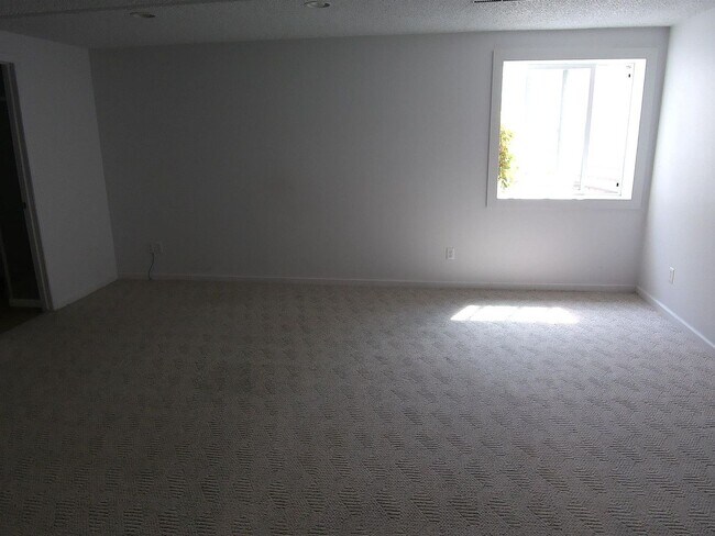 Building Photo - Spacious 4-Bedroom Home with Finished Base...