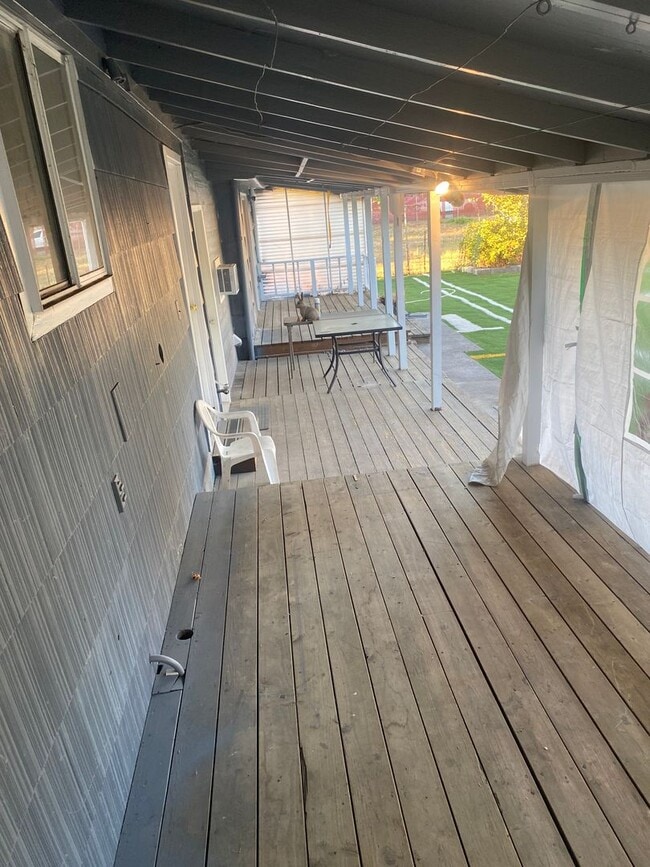 Building Photo - Cozy Single family home with two car garage and controlled access gate