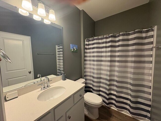 Building Photo - Scenic 3-Bed Townhome with Screened Porch, First Floor Storage & 1-Car Garage – Overlooking the G...