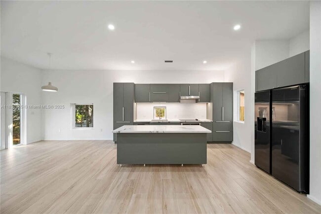 Building Photo - Northwest 9th Court, Miami, FL 33127 - 5 BR 3 BA townhouse