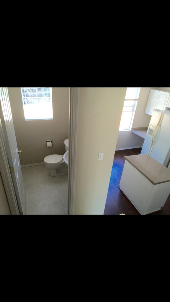 1/2 bath on lower level adjacent to kitchen. - 6123 S 232nd St