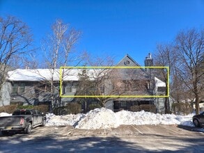 Building Photo - Commuter's delight! Spacious 2nd fl: 2-bed, 2-bath condo with fireplace, washer & dryer & off-str...