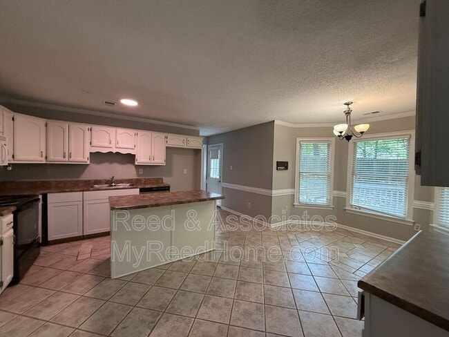 Building Photo - 1687 Magnolia Farms Cove
