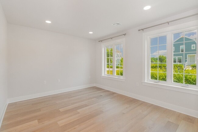 Building Photo - Modern 2025 Townhome | Open-Concept Living, Chef’s Kitchen with Large Island & 2-Car Garage