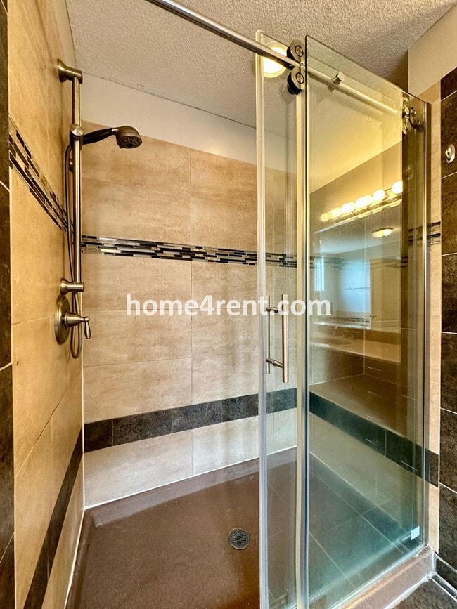 Building Photo - Beautiful Four-Bedroom Home with Three Car...