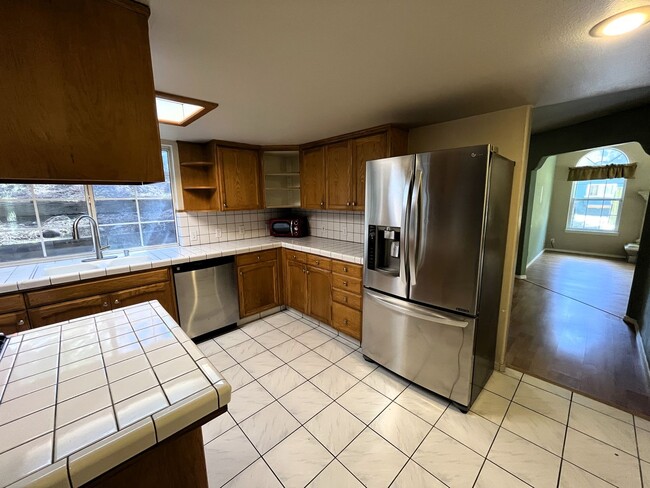 Building Photo - Custom 2-story Humboldt Hill home features 3-car garage, spacious pet-friendly yard