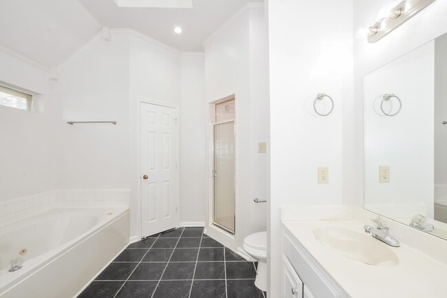 Building Photo - 6650 Spencer Forest Cove E