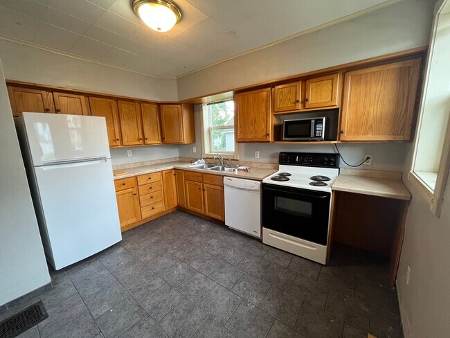 We have a 2nd fridge as fridge space gets tight with 5 people - 579 W Howard St
