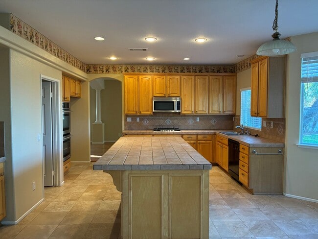 Building Photo - Stunning 4-bedroom hilltop residence nestled in the desirable upper Corona