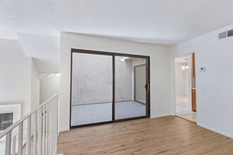 Building Photo - Tri-Level Townhome with Bonus Room | Ranch Los Charcos