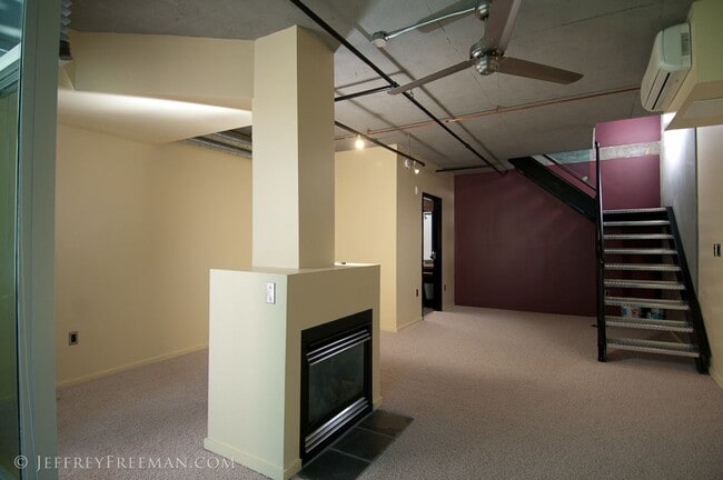 Building Photo - Stunning Penthouse Loft in the Mosaic Condos - Gas Fireplaces, A/C, W/D in unit!