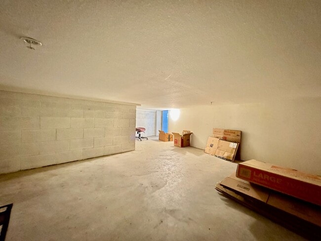Building Photo - Beautifully Remodel Townhouse with AC & Two Car Garage!