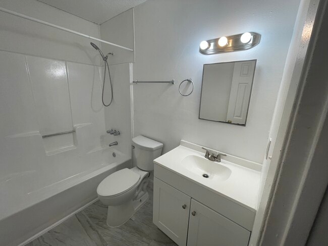 Building Photo - 6831 Tiki Ln